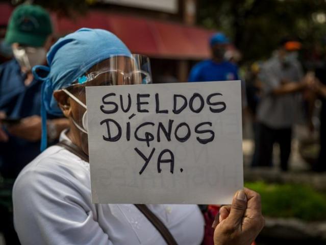 DOBLE LLAVE - Entre reclamos y desafíos venezolanos conmemoran el Día del Trabajador